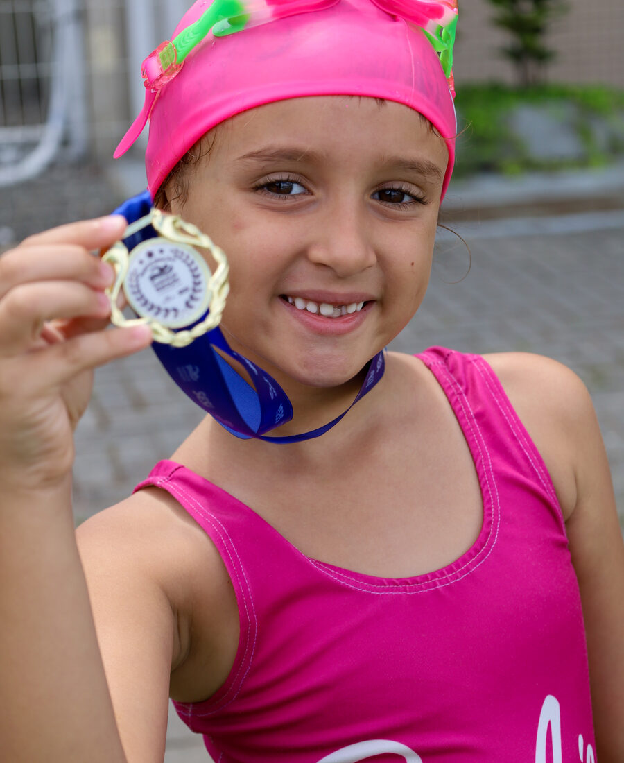 Atleta com medalha de participação