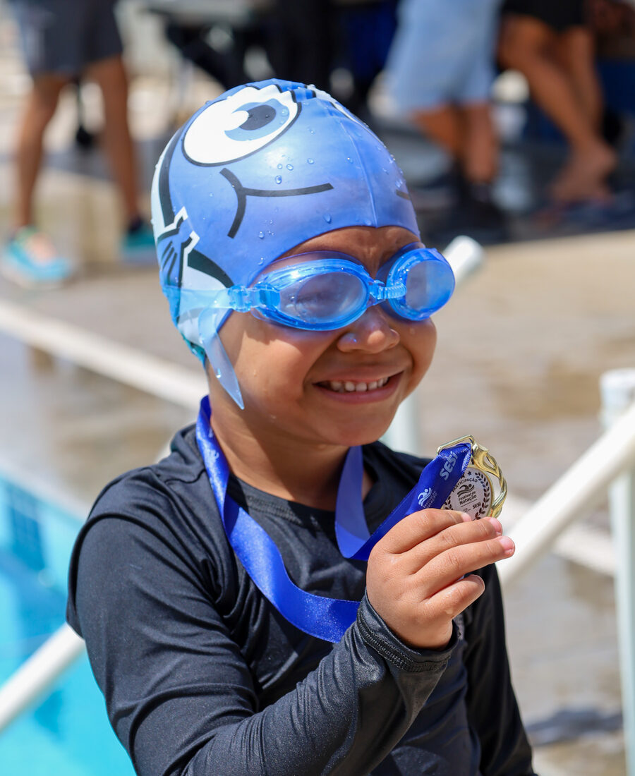 Atleta com medalha de participação